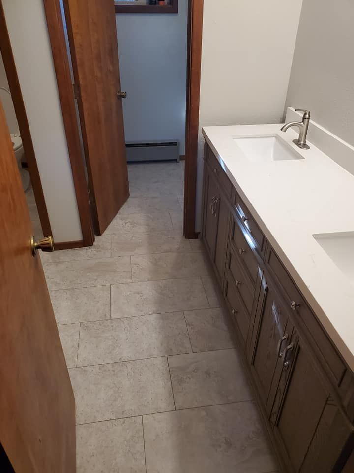 Tile floor of Bathroom — Portland, OR — A-Team Construction Remodeling and Roofing LLC