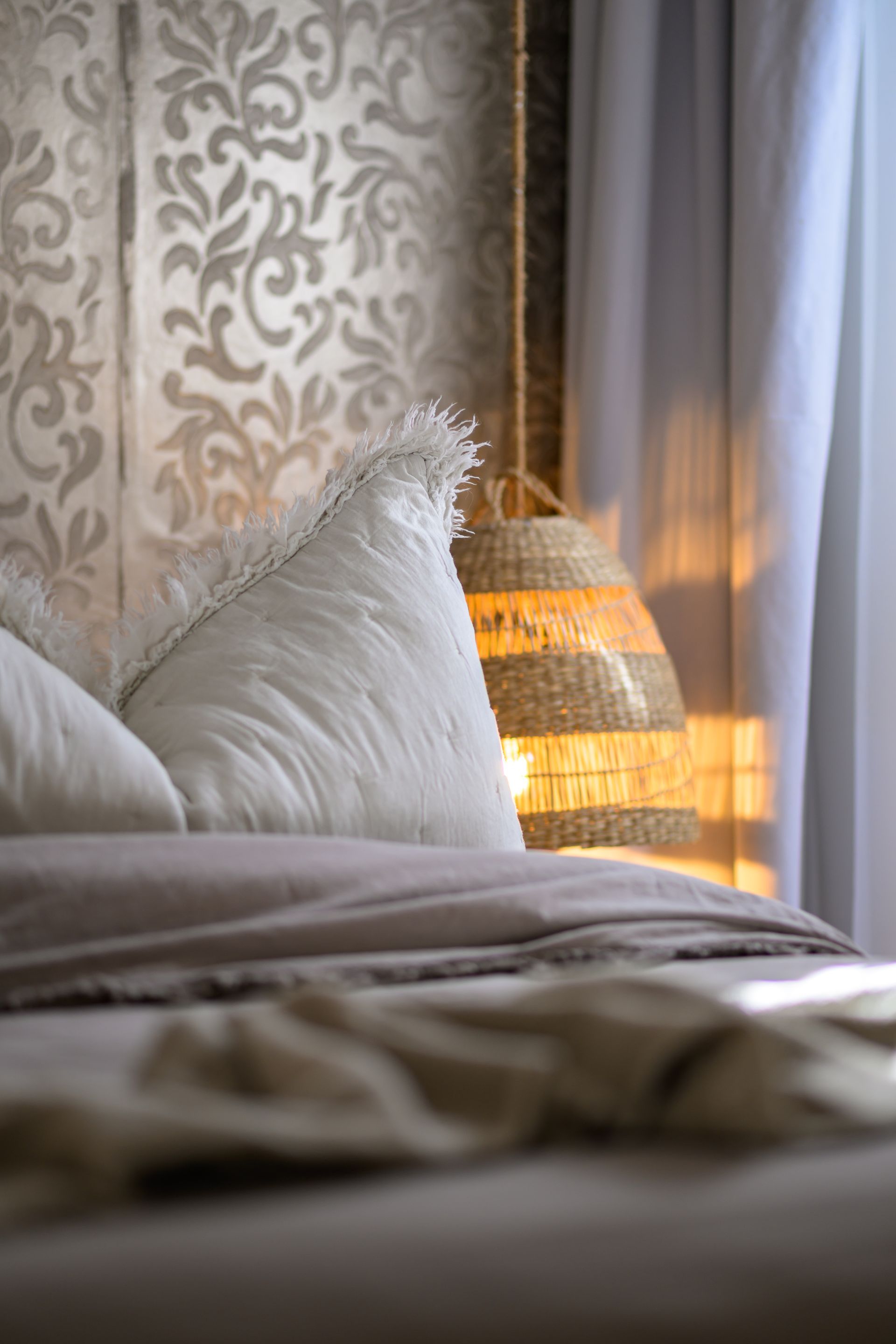 Comfortable bed with large pillows for resting