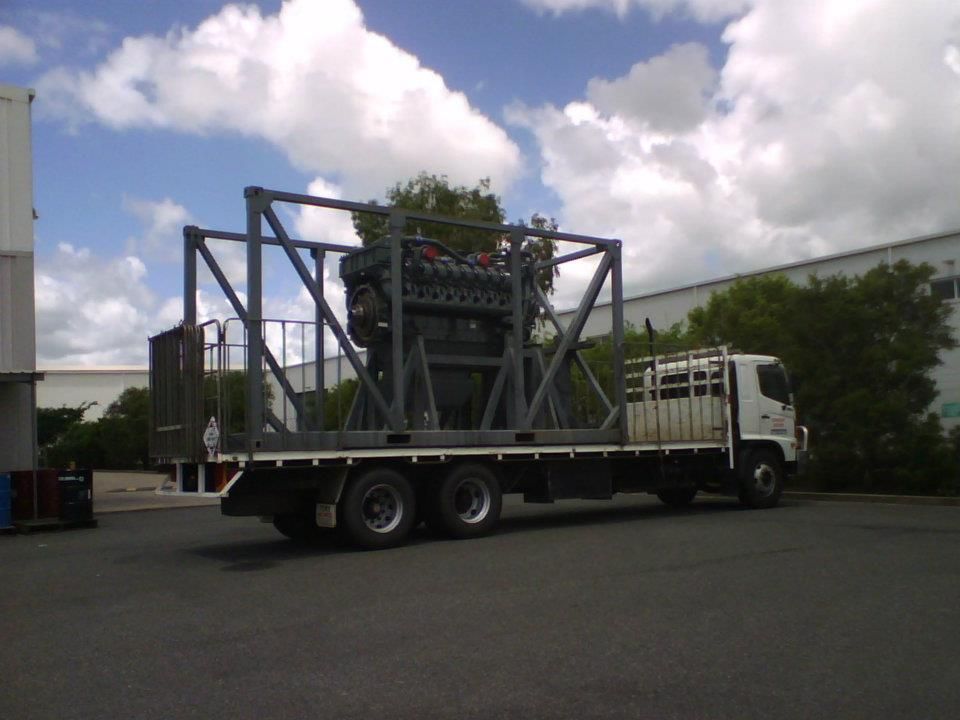 A Truck With a Large Metal Structure — Supersonic Couriers In West Mackay, QLD