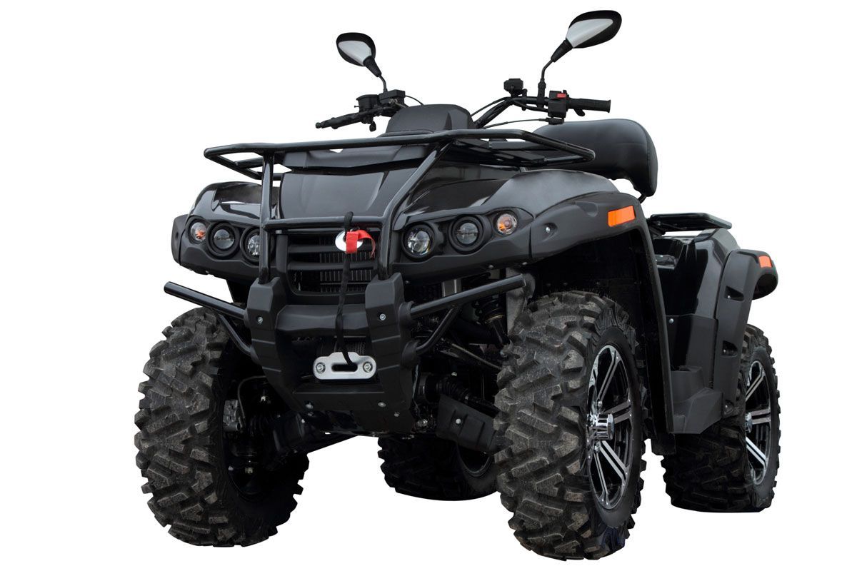 A black atv is sitting on a white background.