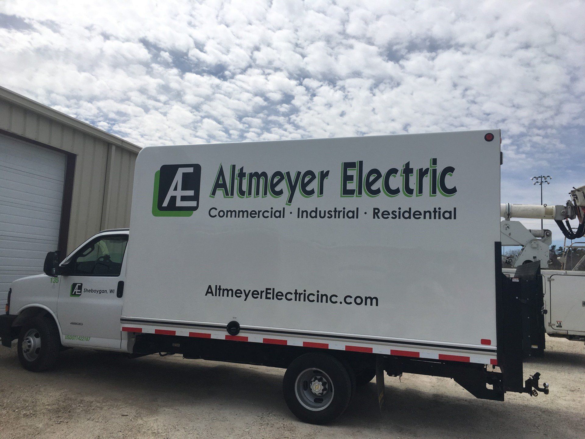 Parking Lot Lighting — Altmeyer Electric White Pick Up Truck In Sheboygan, WI