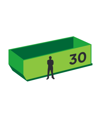 A man is standing next to a green dumpster with the number 30 on it.
