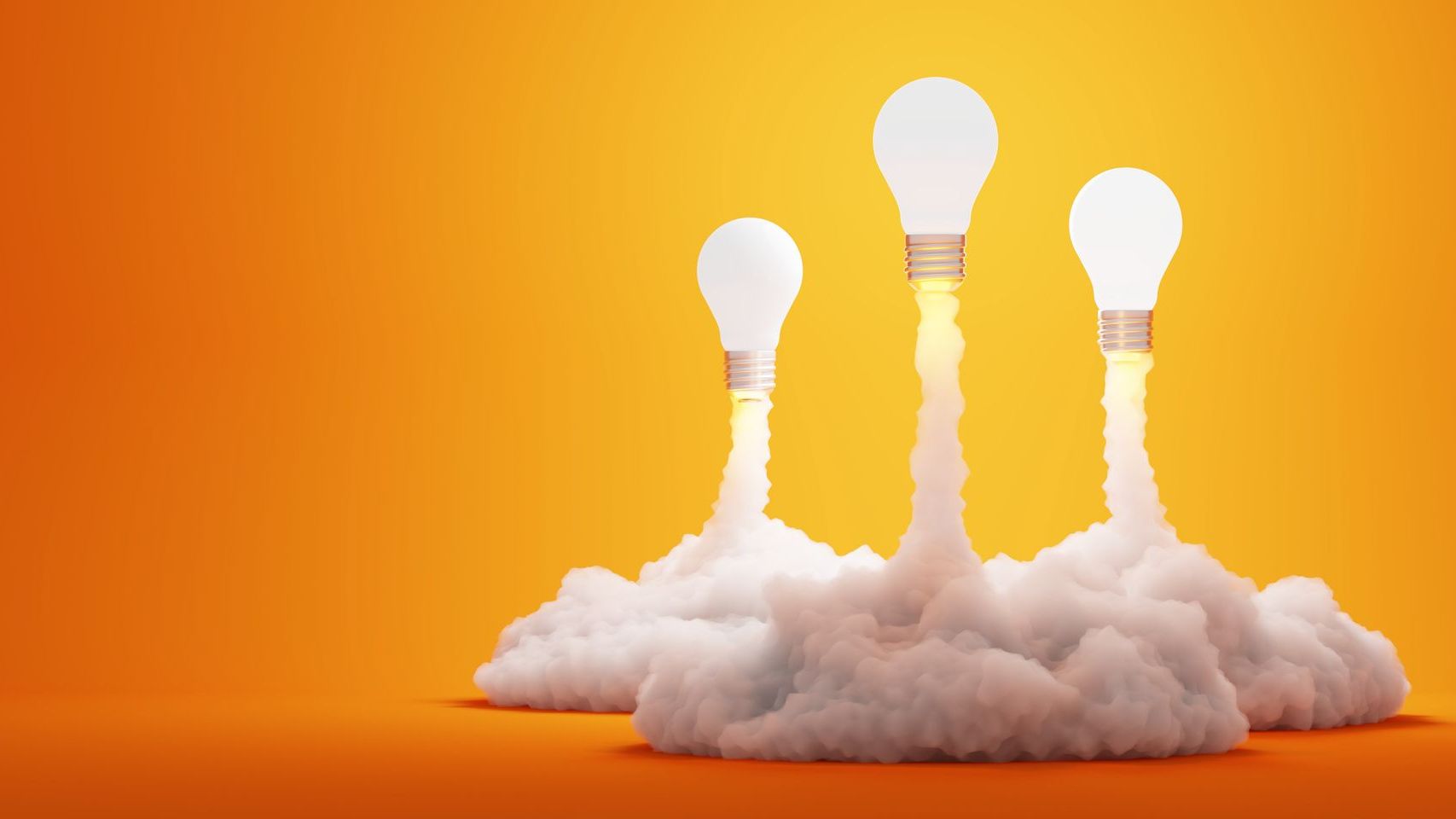 Three light bulbs are flying through the air with smoke coming out of them.