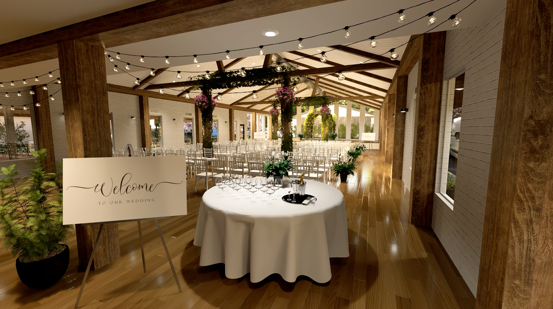 Wedding venue with wooden beams, fairy lights, and a welcome sign. Chairs are set up for a ceremony.