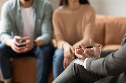 Support group session with participants sharing experiences