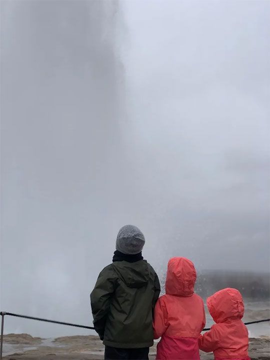 Three children are standing