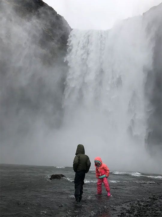 children at waterfall