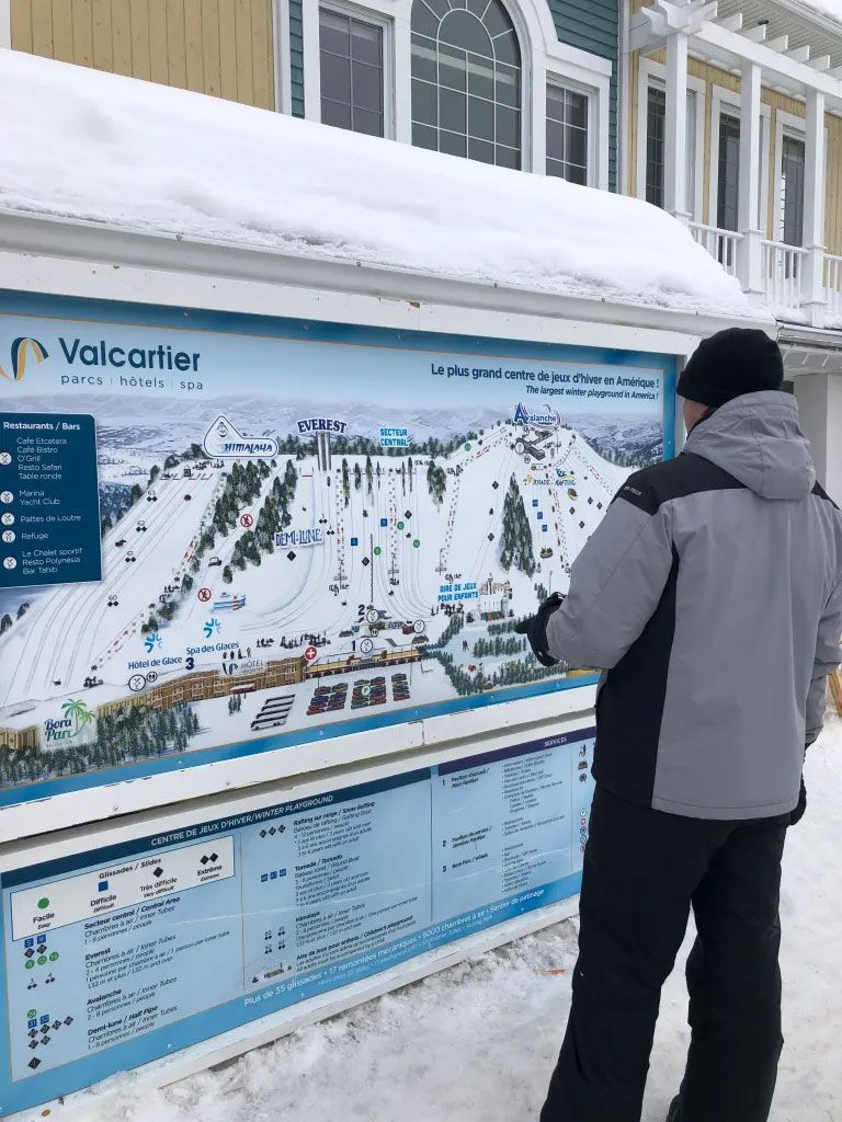 A man is looking at a map 