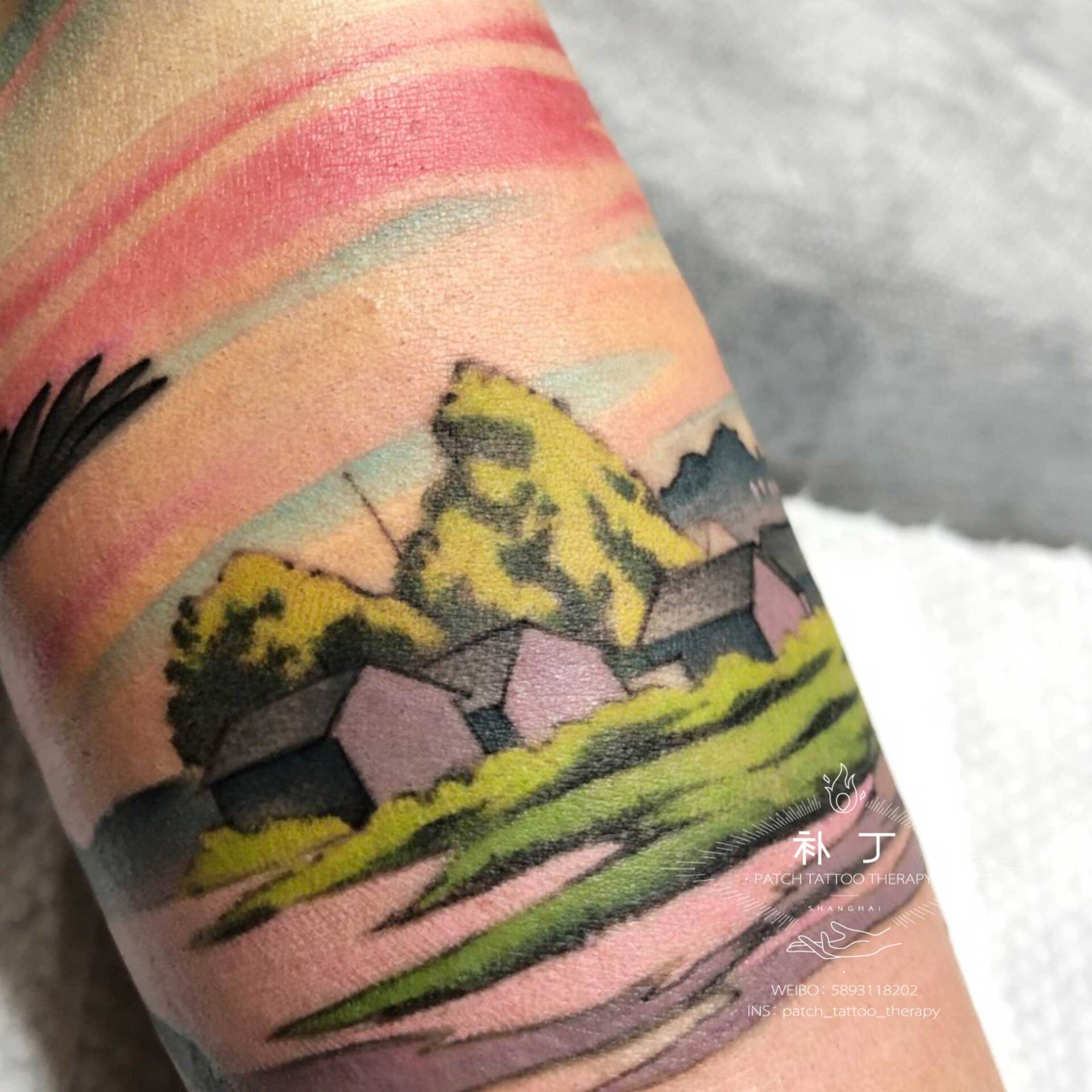 Forearm sleeve tattoo of a peaceful scene featuring a boat, lake, ducks, and rustic buildings in Japanese styled color designed by Jingxi Gu at Patch Tattoo Therapy - angle 7