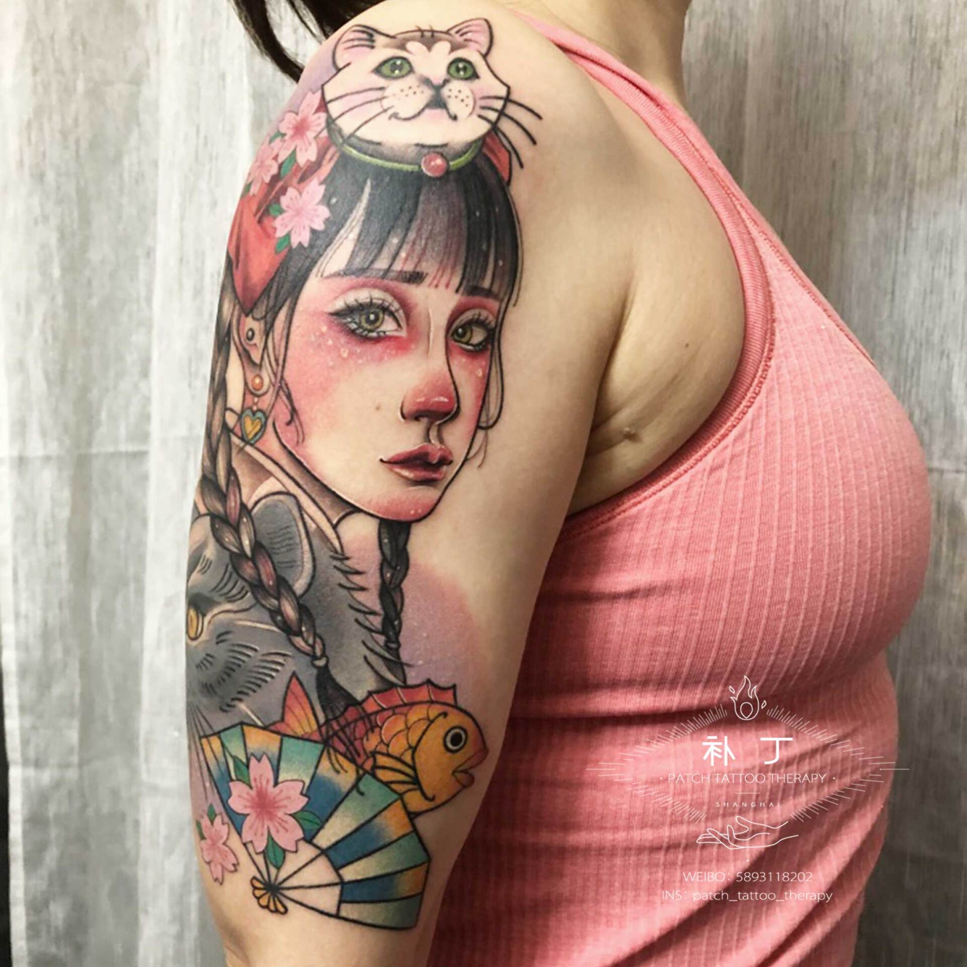 Outside arm tatttoo of a daughter with her cats, fan, and fish done in Japanese color style designed by Jingxi Gu at Patch Tattoo Therapy - angle 1