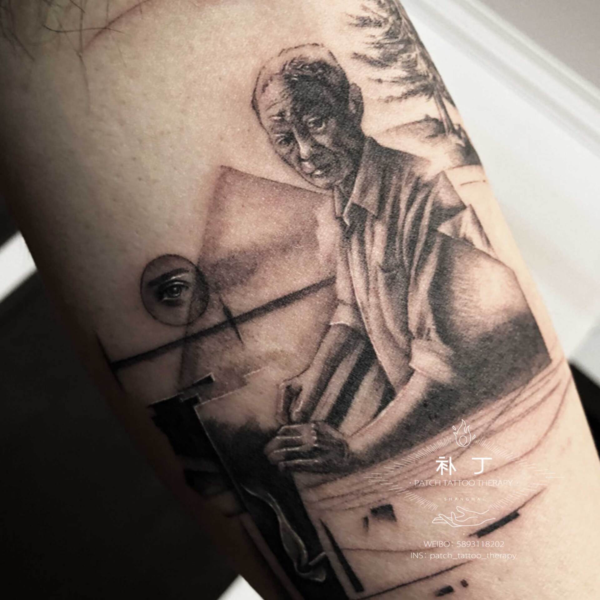 Inner arm tattoo of a grandfather with a focus on his hands against a tree nature environment in geometric style designed by Jingxi Gu at Patch Tattoo Therapy - angle 2