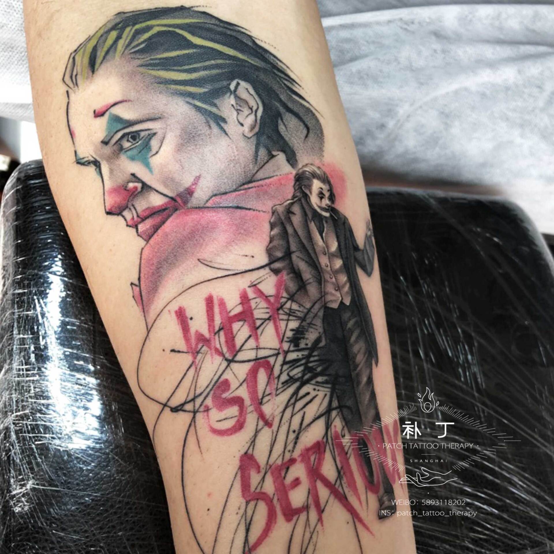 Inner forearm tattoo of Joker portrait and walking Joker with words Why So Serious in painting styled color designed by Jingxi Gu at Patch Tattoo Therapy - angle 1