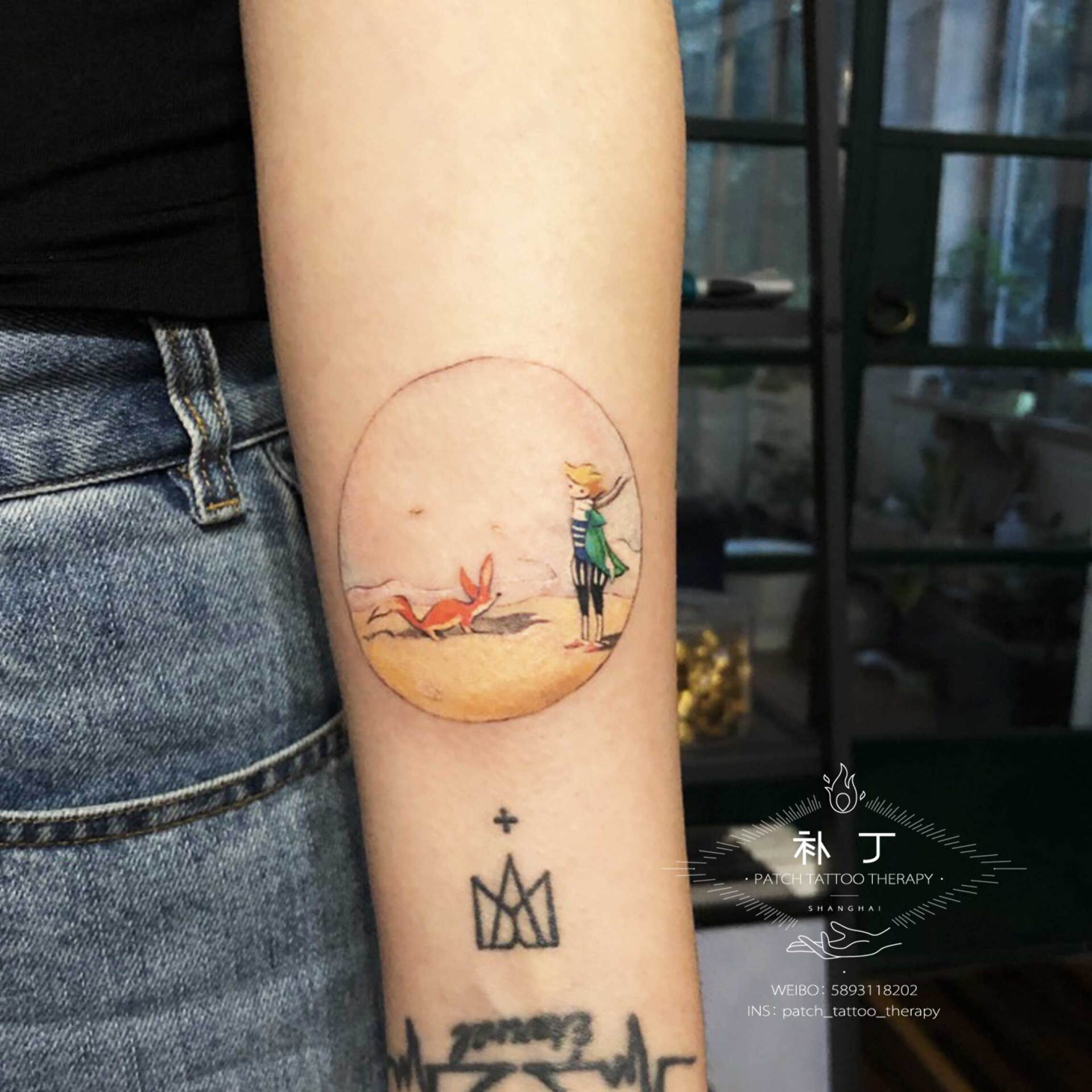 Inner forearm tattoo of the Little Prince and his fox in micro mini color designed by Jingxi Gu at Patch Tattoo Therapy