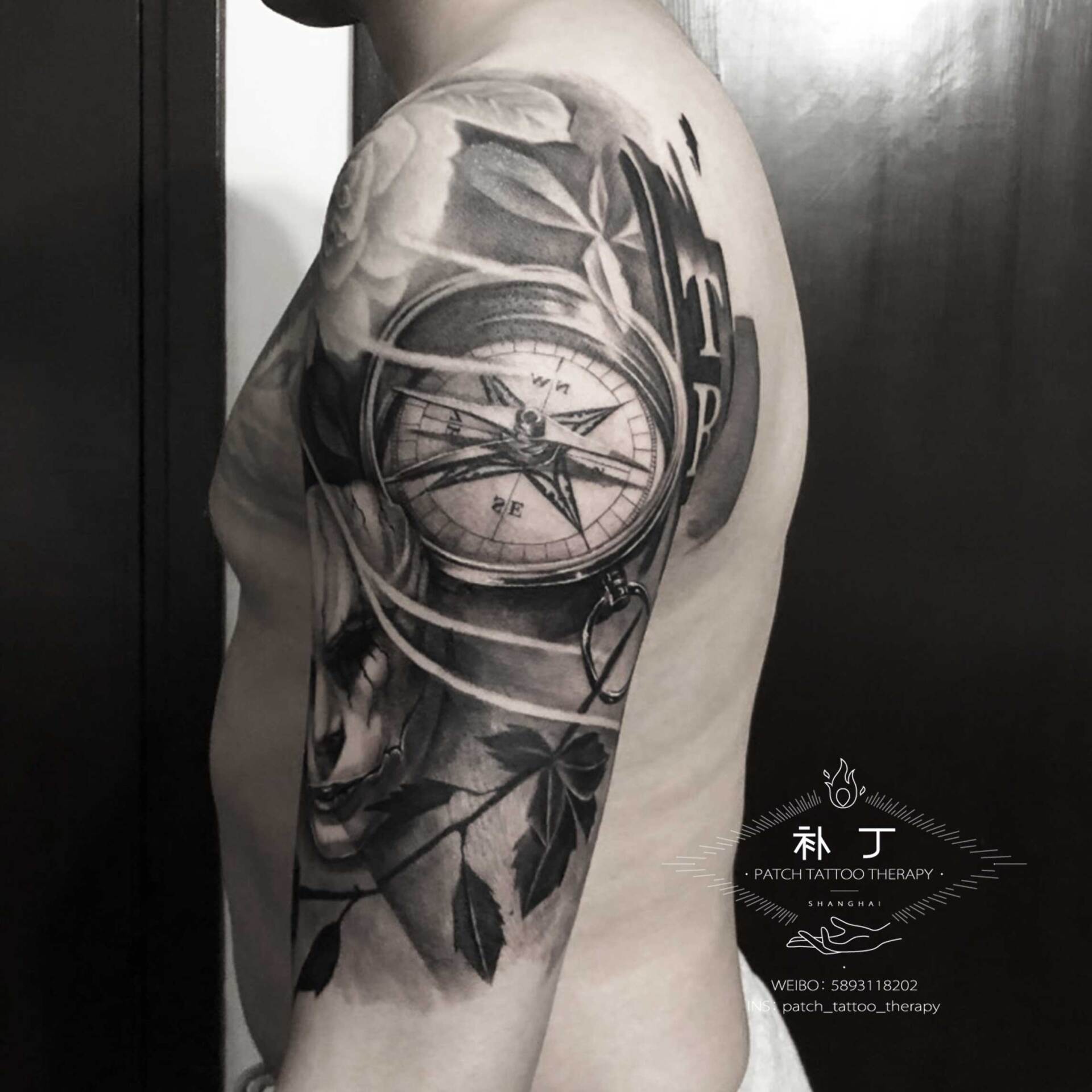 Half upper arm sleeve tattoo of a masked man, clock and rose in black and grey realistic style designed by Jingxi Gu at Patch Tattoo Therapy - angle 2