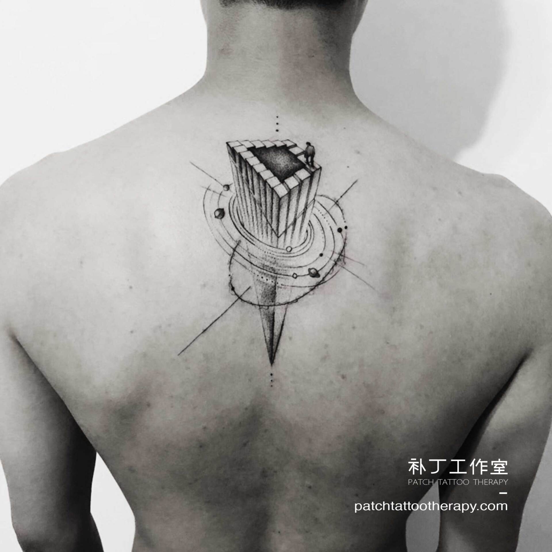 Back tattoo of Penrose Stairs influenced by Escher in geometric style designed by Jingxi Gu at Patch Tattoo Therapy