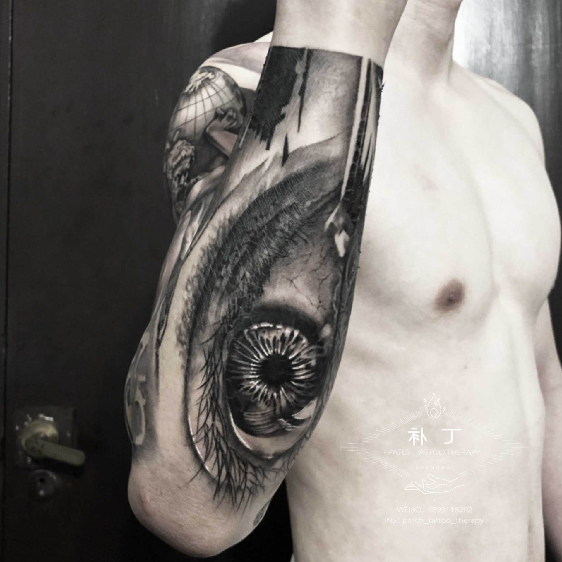 Full arm sleeve featuring a man fighting off meteors and comets with a lion portrait on the shoulder in black and grey realistic style designed by Jingxi Gu at Patch Tattoo Therapy - angle 4