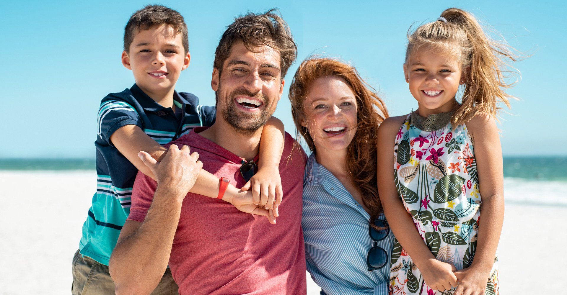 Happy Family at the Beach — Fort Gratiot, MI — Hamzavi Dermatology & Dermatology Specialists