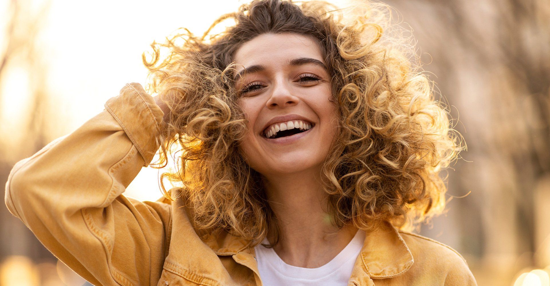 Smiling Young Woman — Fort Gratiot, MI — Hamzavi Dermatology & Dermatology Specialists