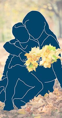 blue silhouette of mother holding child, autumn leaves.