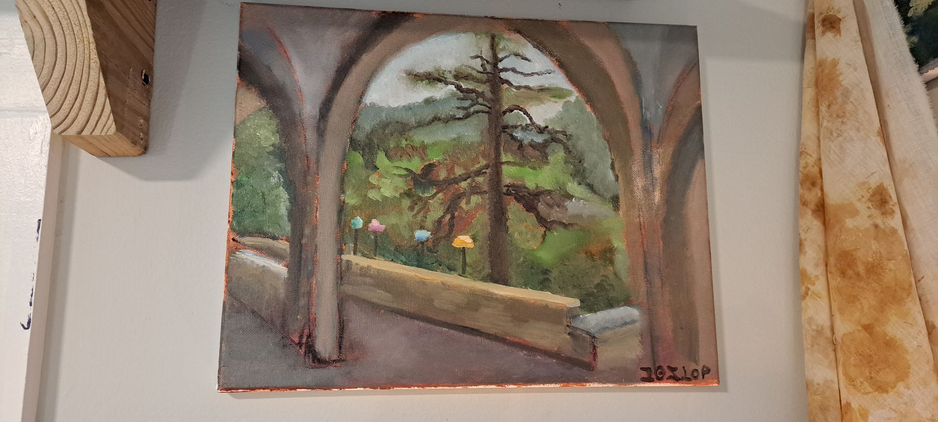 Painting of a landscape framed by arches; trees and greenery visible through the archway; tan and grey colors.