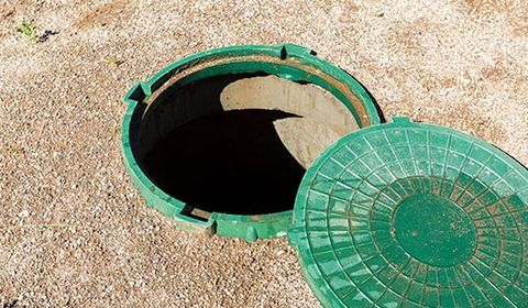 Leech Field — Hole In The Ground With Green Cover in Weston, CO
