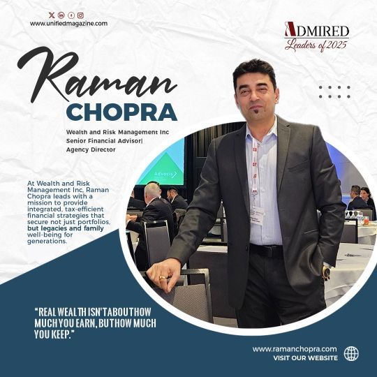 Portrait of Raman Chopra in a black suit with event branding and corporate backdrop