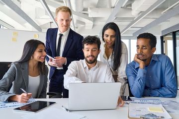 A group of business people are discussing about financial planning.