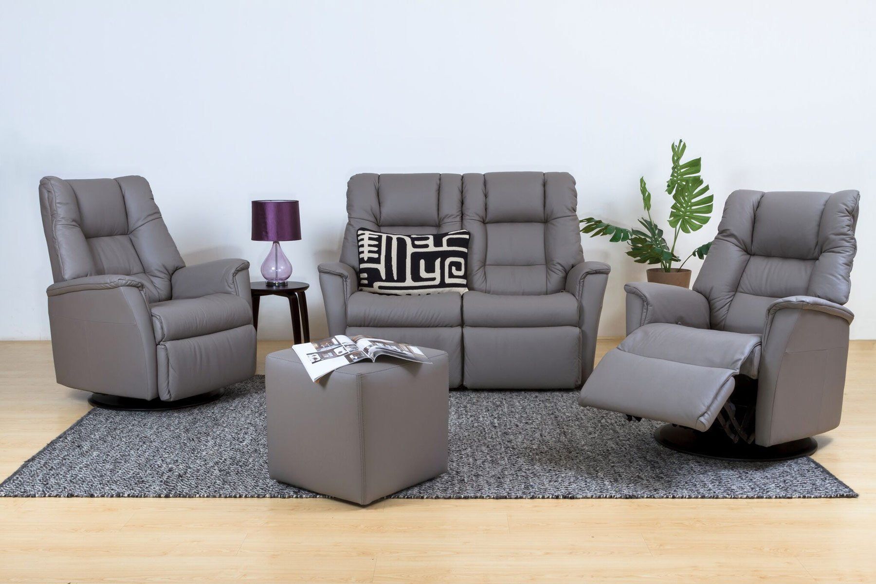 Grey Recliners, Loveseat, Ottoman on Rug — Hastings Specialty Furniture In Port Macquarie, NSW