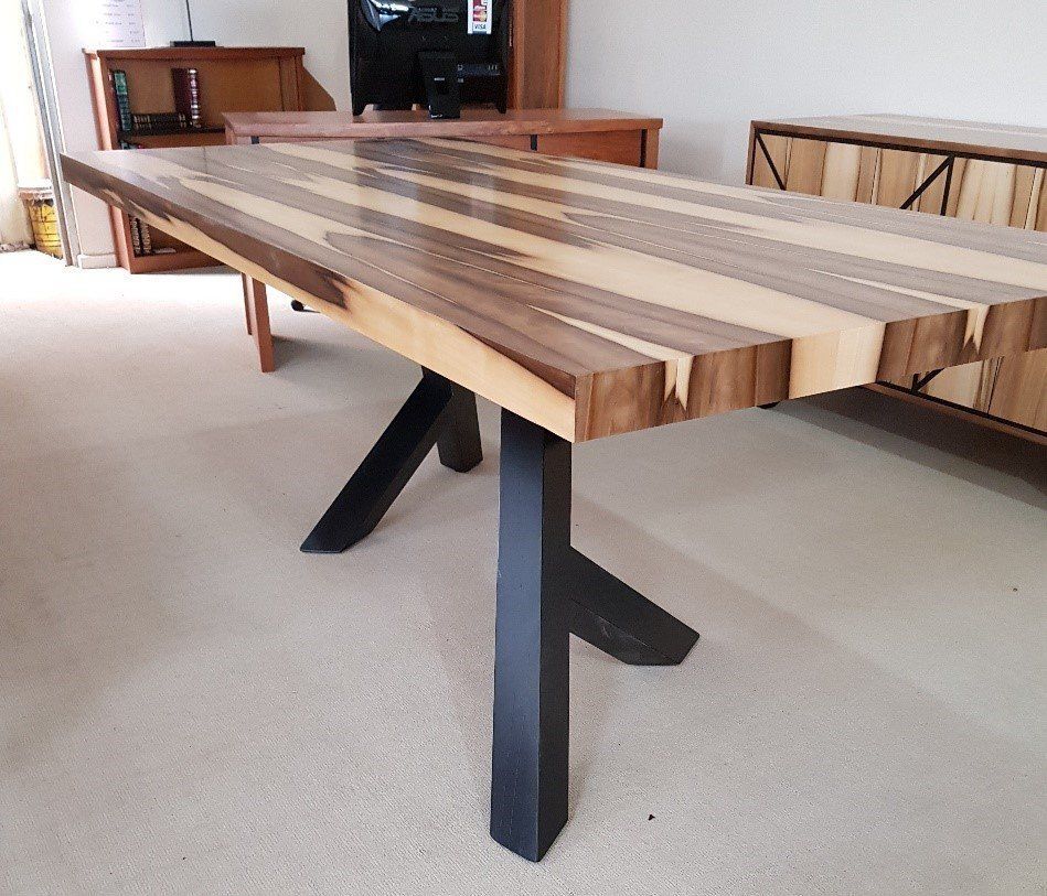 Wooden Rectangular Dining Table With a Black Metal Base — Hastings Specialty Furniture In Port Macquarie, NSW