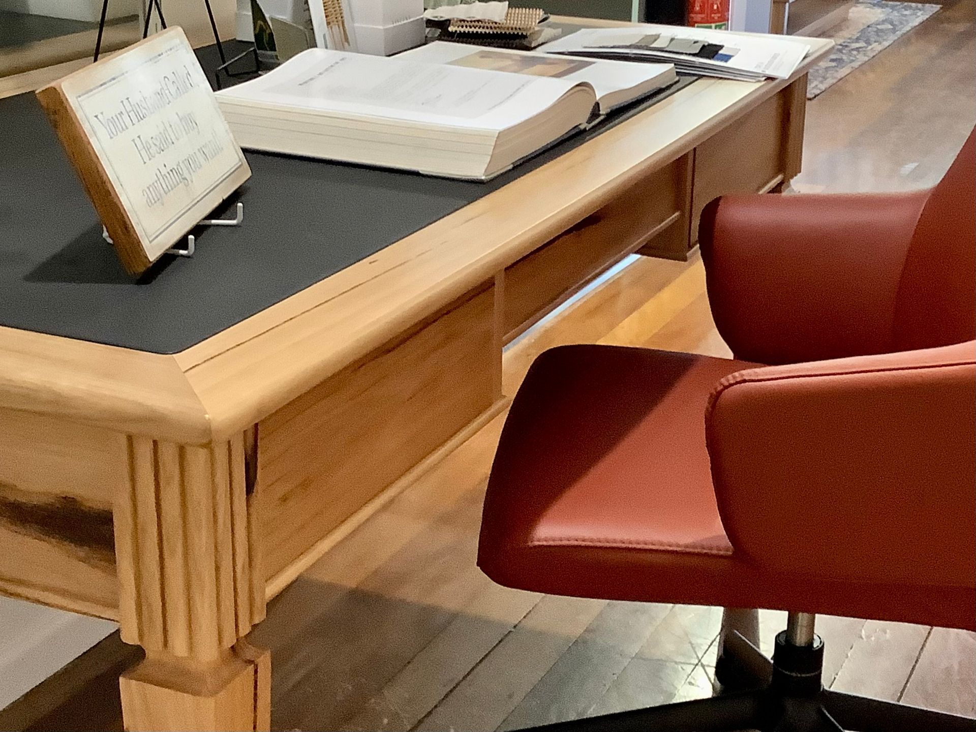 Wooden Desk With a Large Open Book — Hastings Specialty Furniture In Port Macquarie, NSW