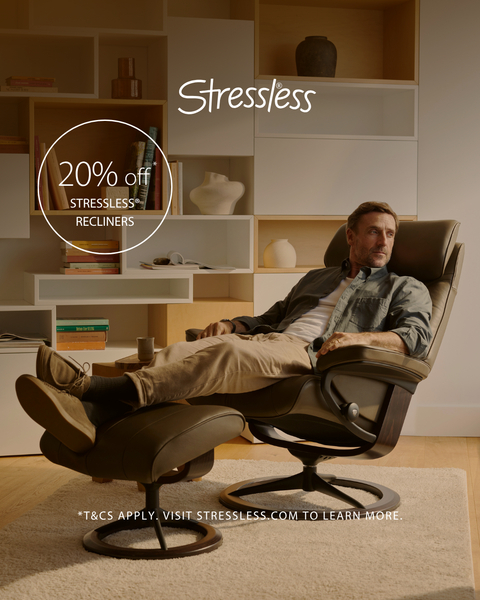 Man Relaxing in a Stressless Recliner With Ottoman — Hastings Specialty Furniture In Port Macquarie, NSW