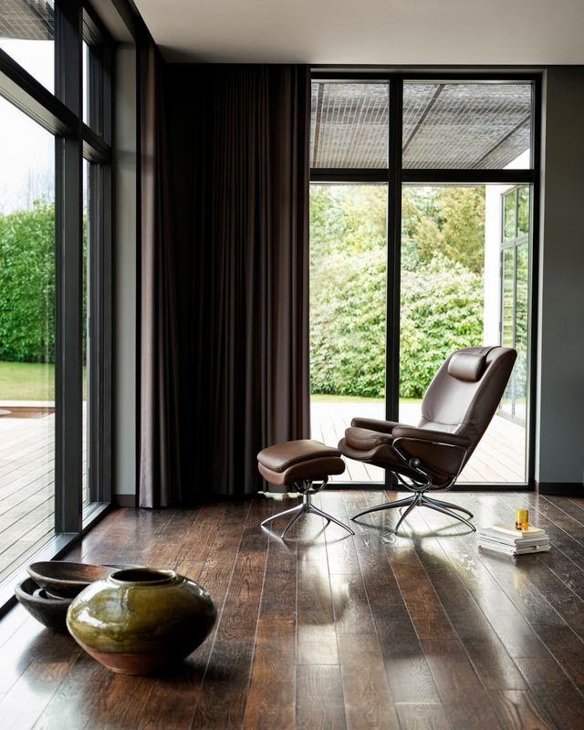 Modern Living Room With Leather Chair and Footstool — Hastings Specialty Furniture In Port Macquarie, NSW