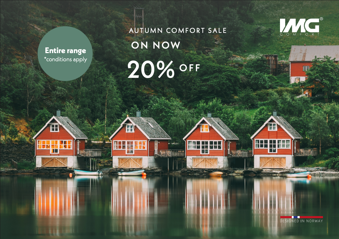 An IMG Norway advertisement for an Autumn Comfort Sale, offering 20% off, featuring red cabins reflected in a lake.