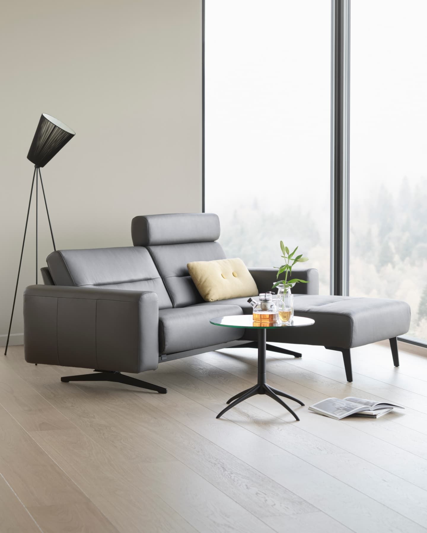 Grey Leather Sofa With Headrest and Ottoman — Hastings Specialty Furniture In Port Macquarie, NSW