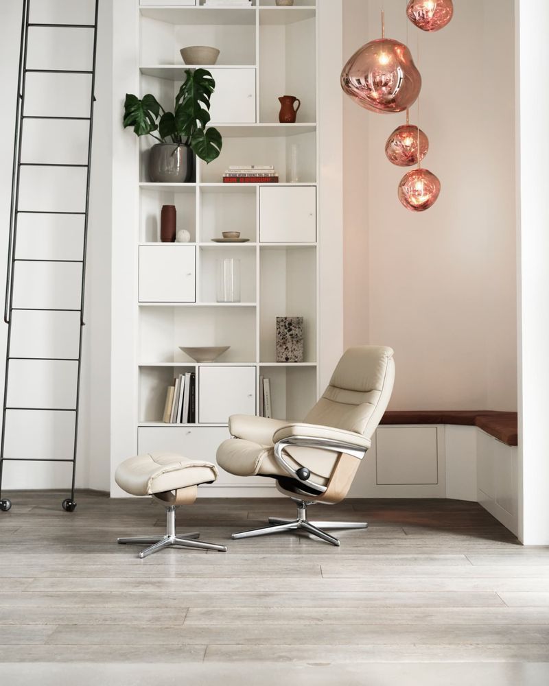 Cream Recliner With Ottoman in a Modern White Room — Hastings Specialty Furniture In Port Macquarie, NSW