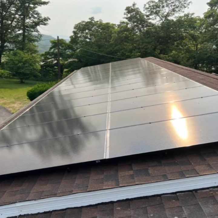 A roof with a lot of solar panels on it