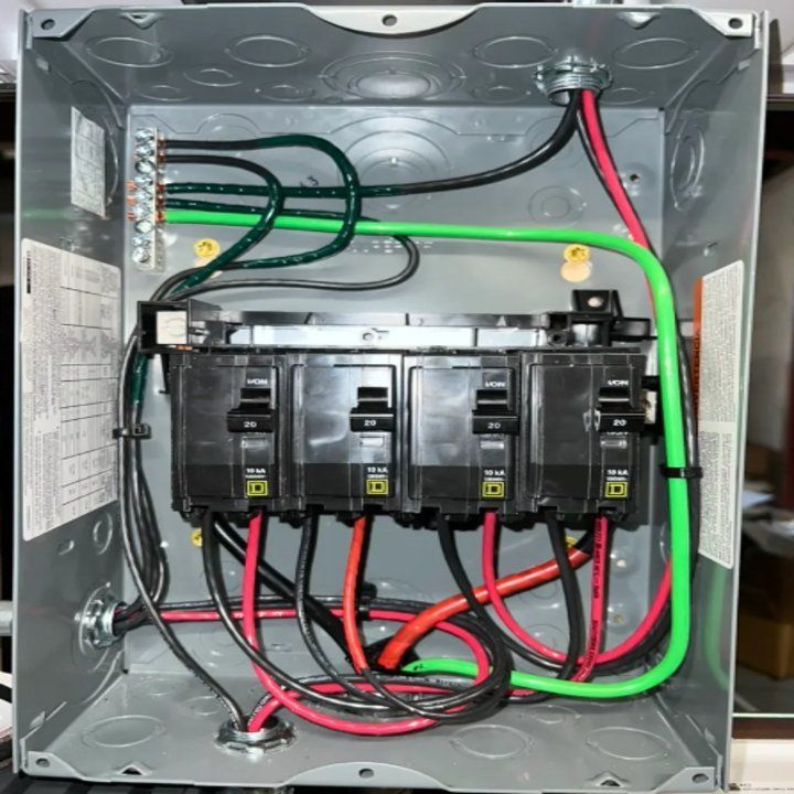 A box with a bunch of wires coming out of it