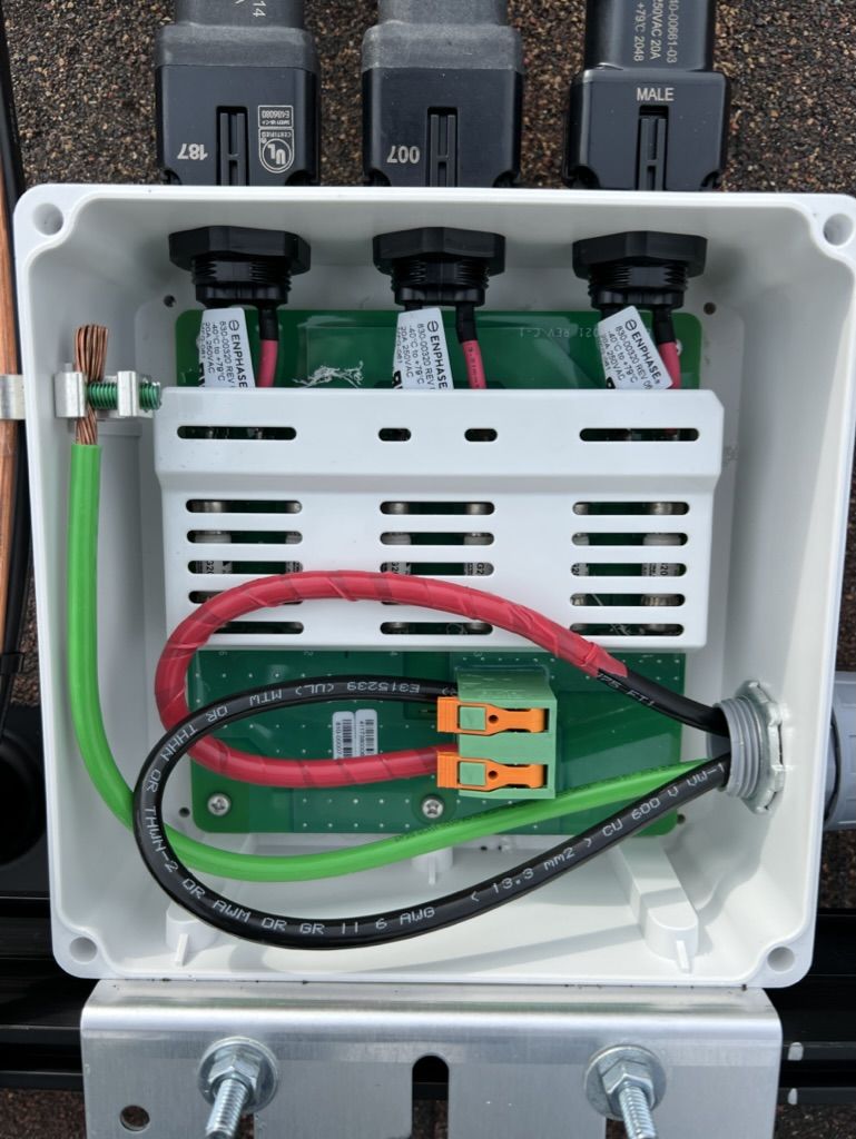 A white box with electrical wires inside of it