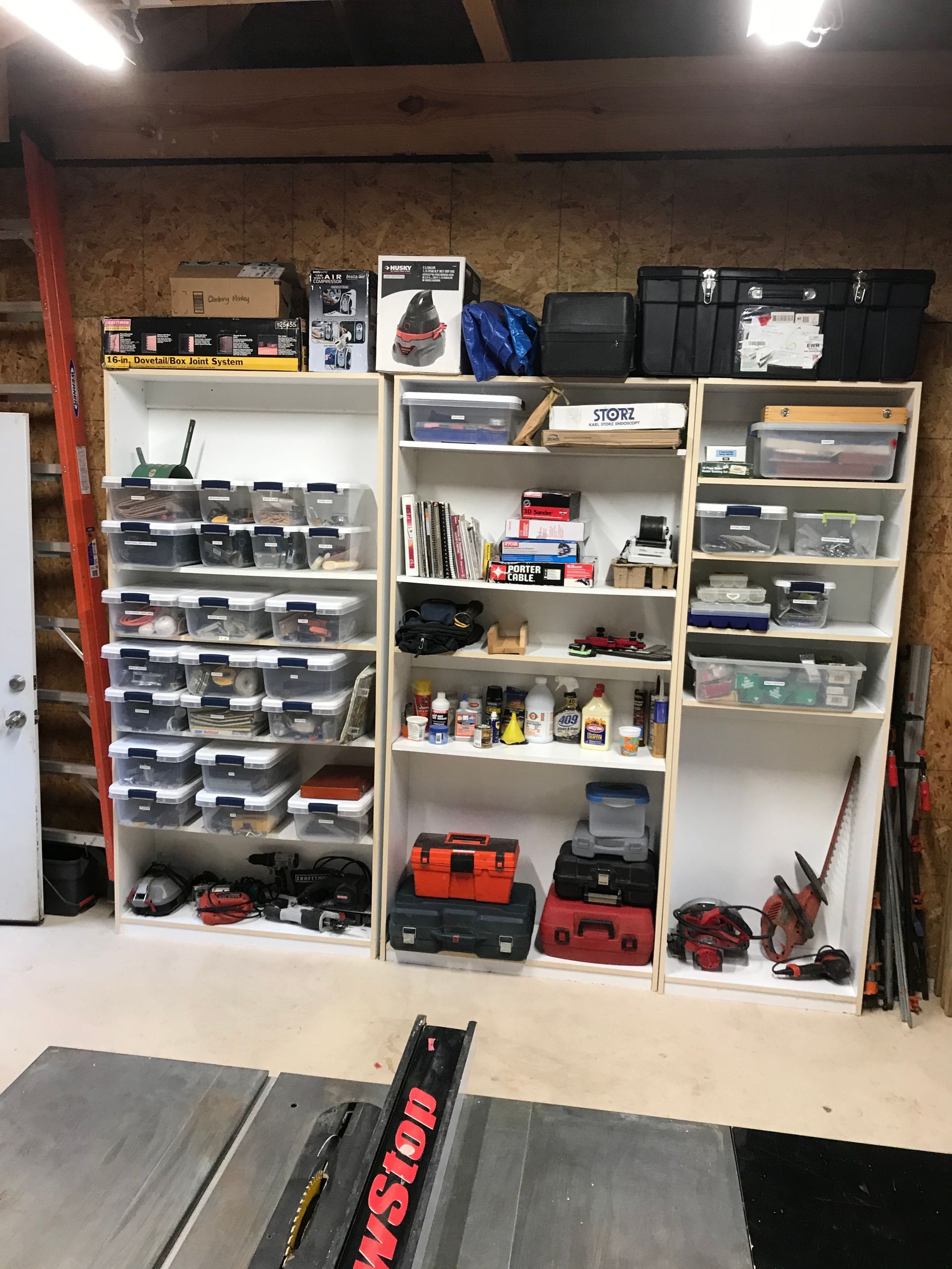 A garage filled with lots of shelves and boxes