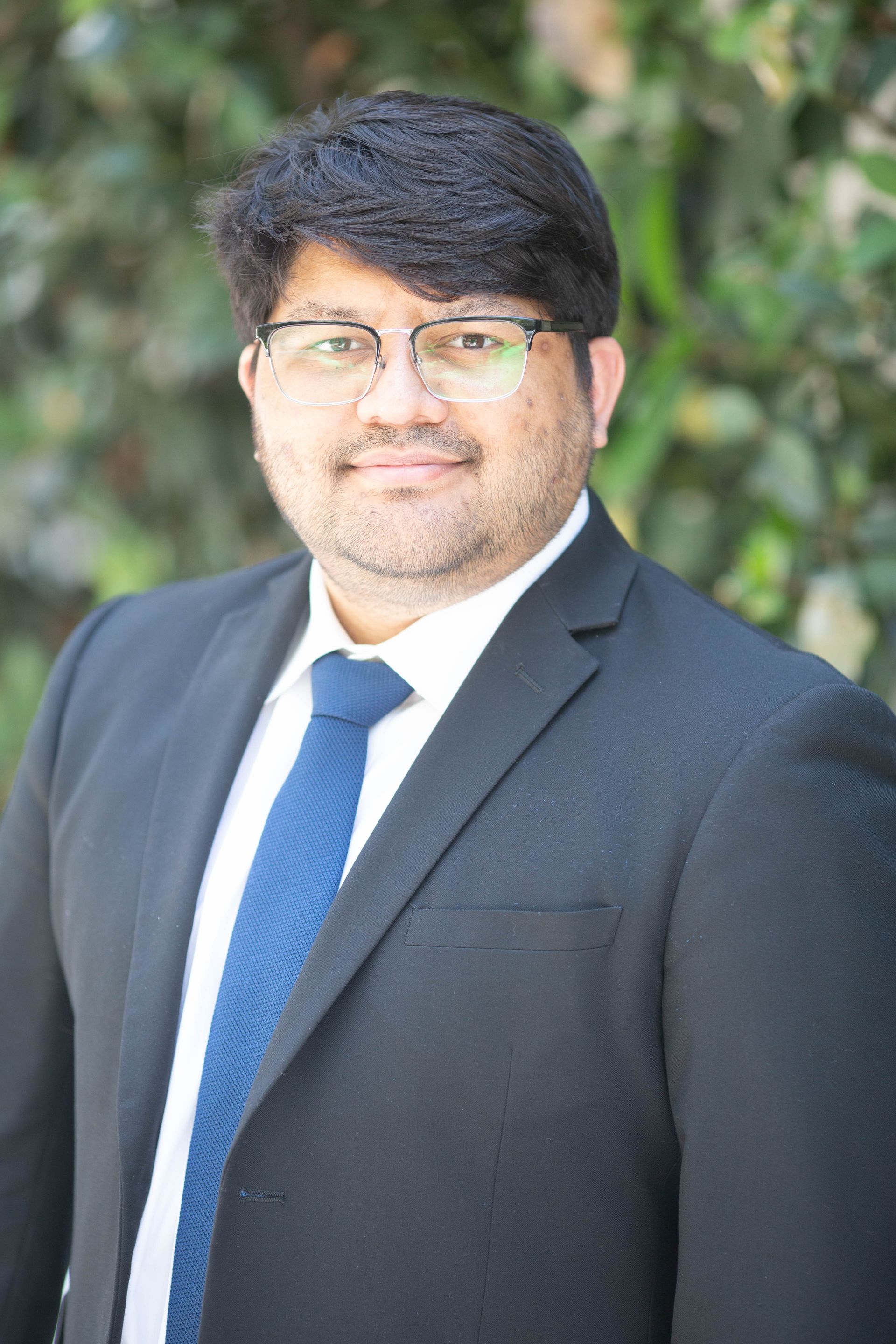 Fahim Rahman with greenery in background