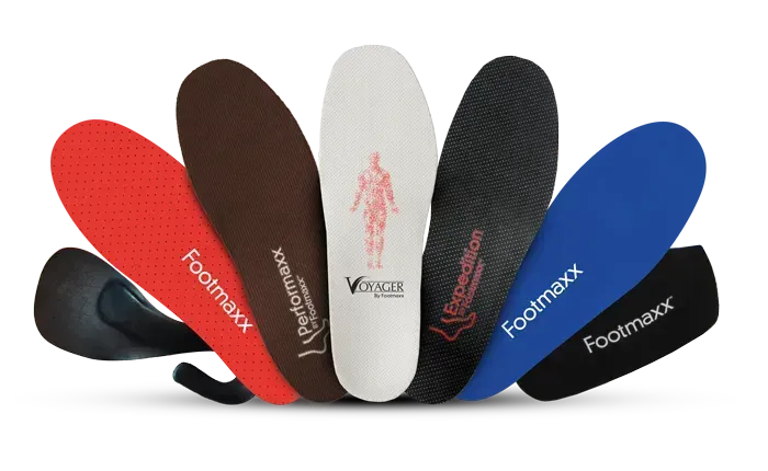 Several colorful shoe inserts are fanned out, showcasing different textures and branding.