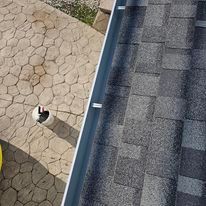 An aerial view of a gutter and a roof.