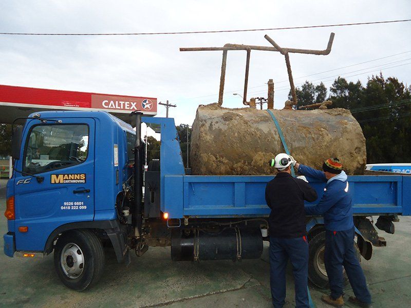 Blue Truck and Workers — Woronora Heights, NSW — Mann's Earthmoving