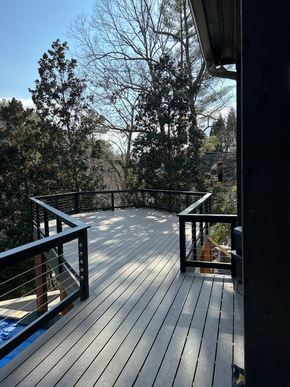 A house with a balcony on the side of it