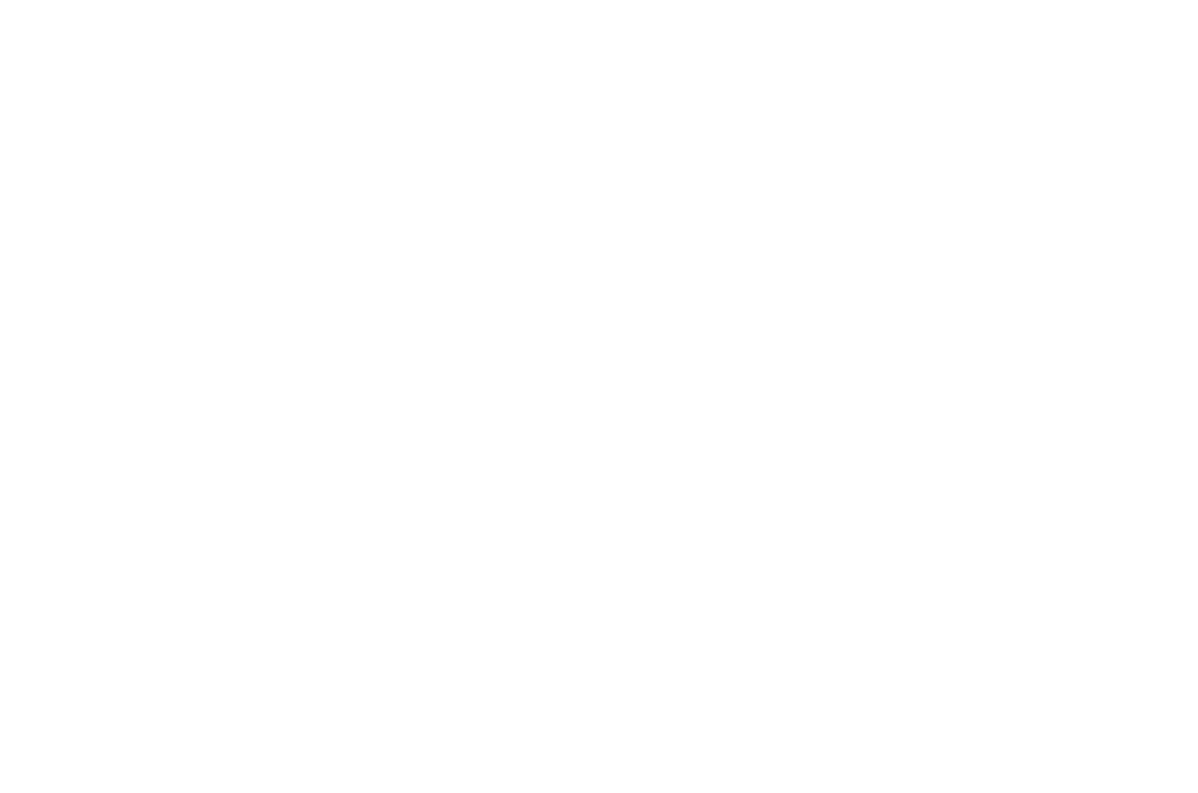 A black and white close-up shows the textured surface of a golf ball with its characteristic pattern of small dimples.