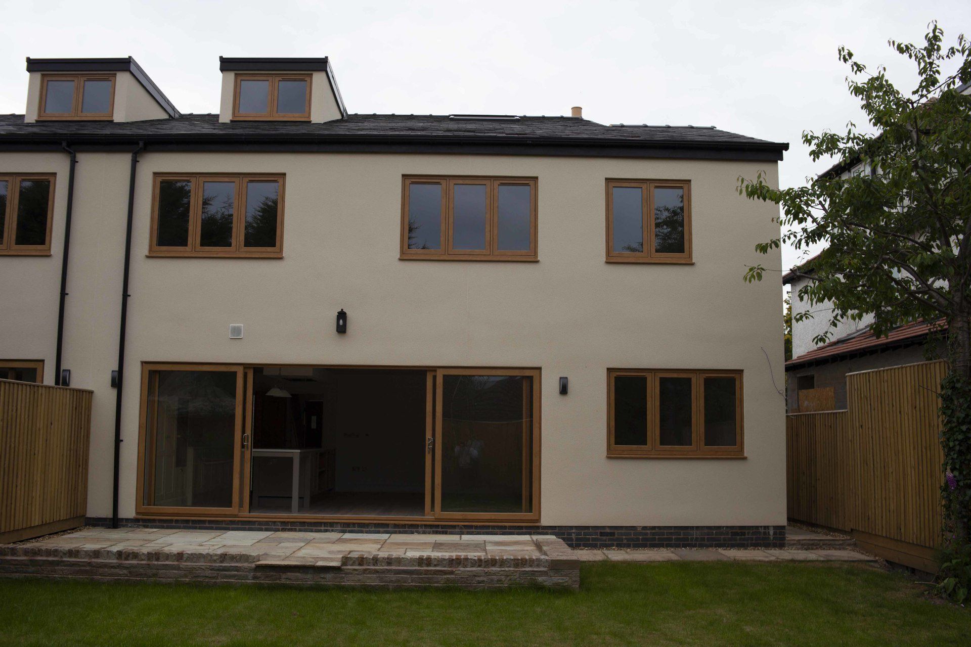The back of a house with sliding glass doors