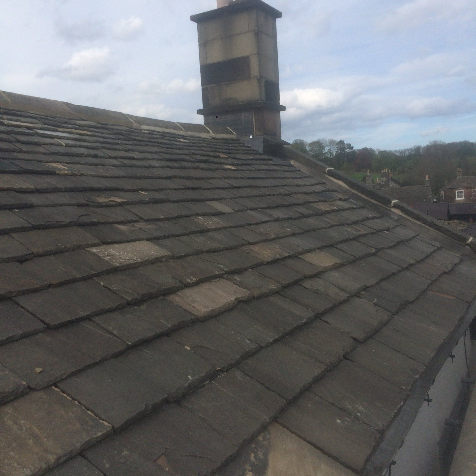 A roof with a chimney on top of it.