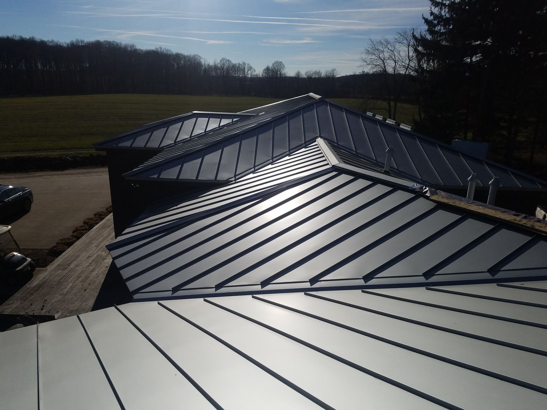 The roof of a building has a lot of lines on it