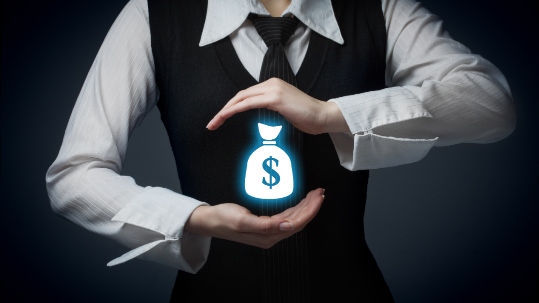 A woman is holding a bag of money with a dollar sign on it