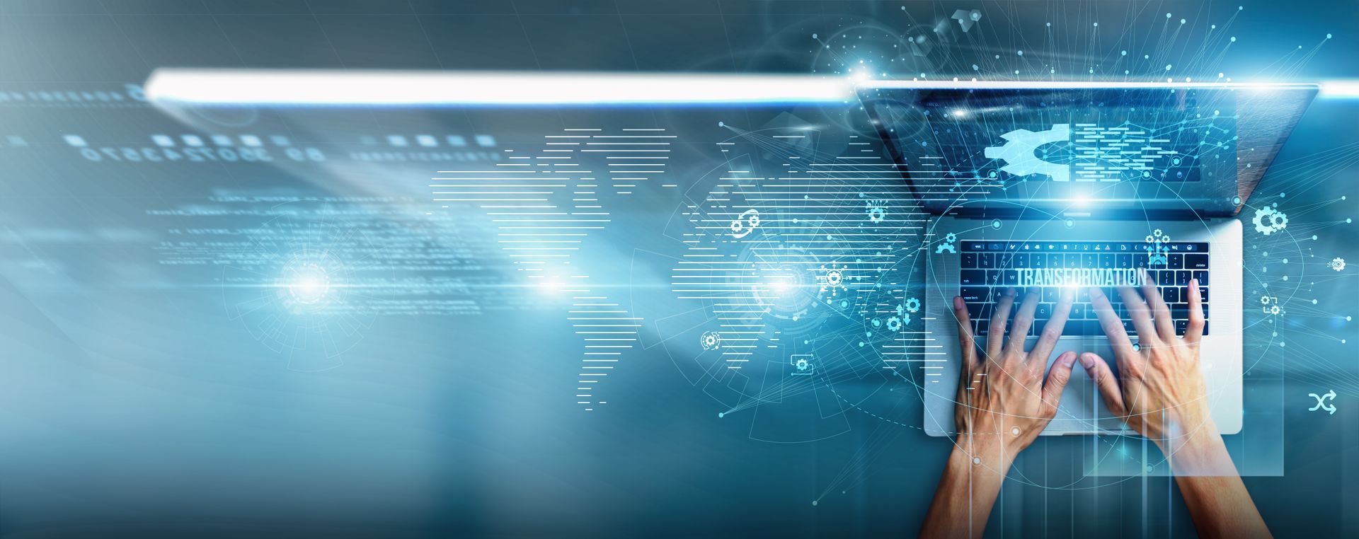 Hands typing on a laptop with a glowing blue digital overlay, suggesting technology and data.